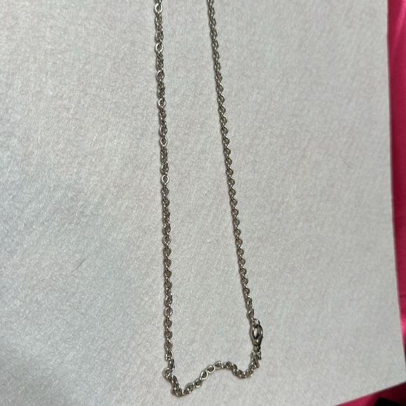 Silver colored chain with purple translucent glass. - Picture 3 of 5